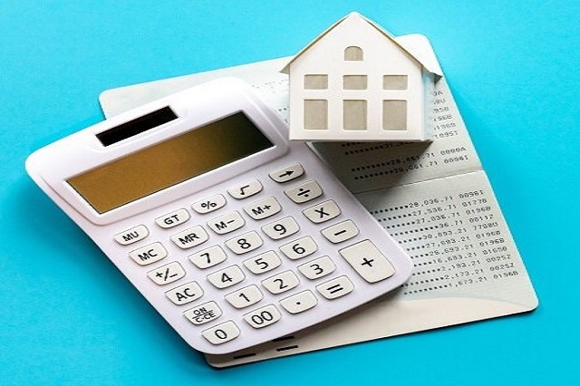 close up top view group of calculator , home model and banking a